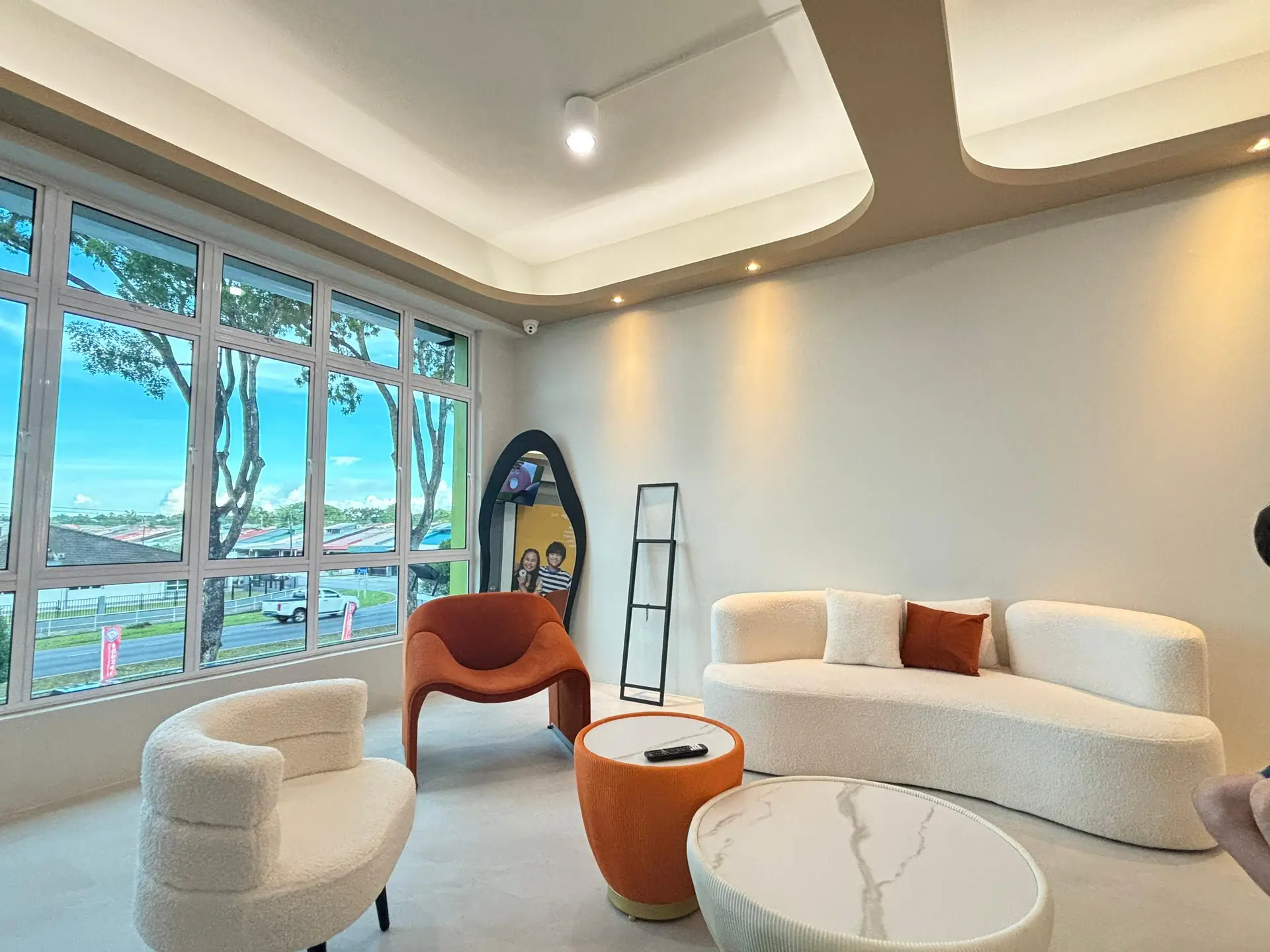 Modern, clean waiting area for patients in D Dentist's Tabuan Jaya branch in Kuching.